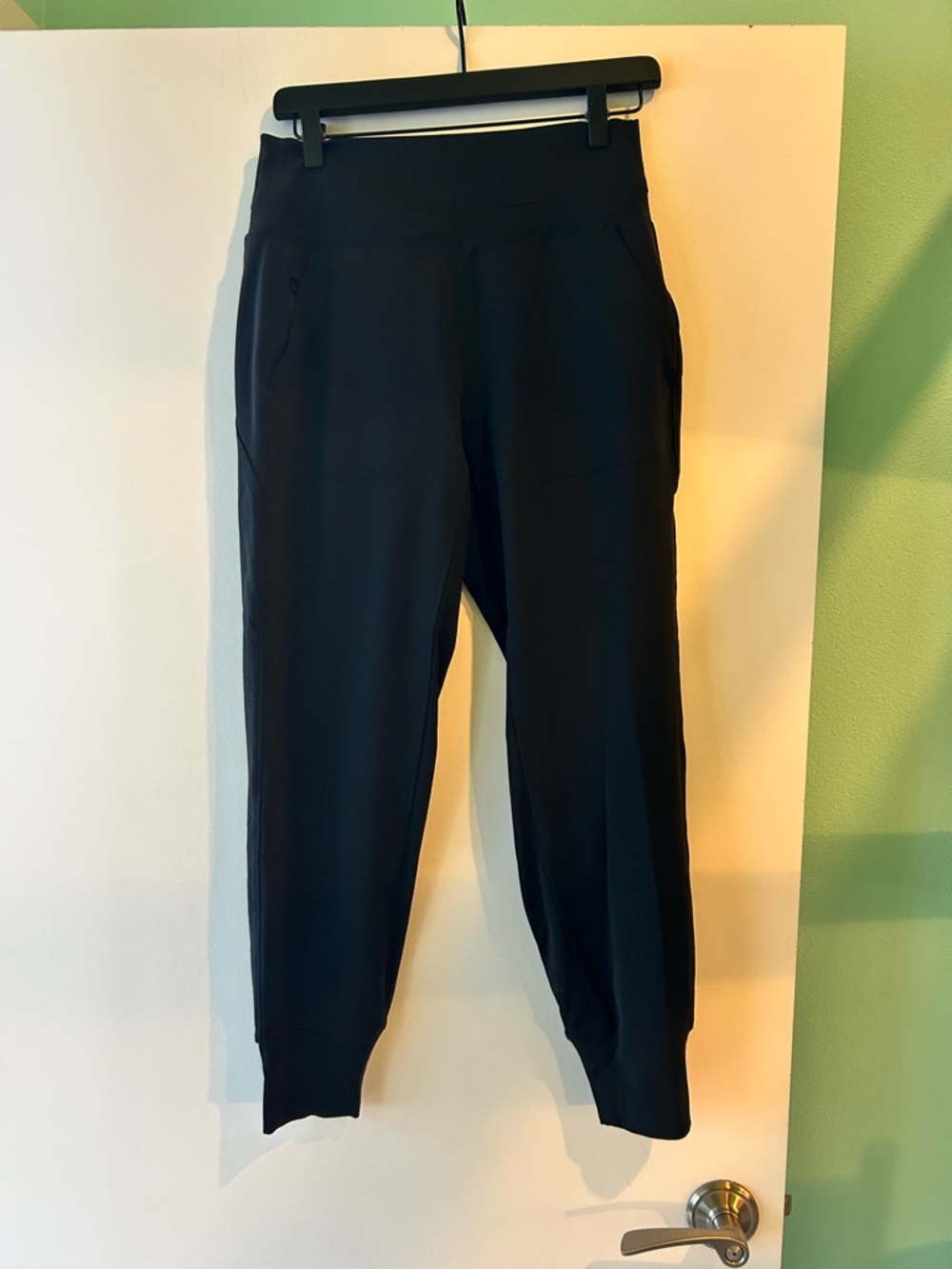 Athleta Black Performance joggers with zipper pockets
